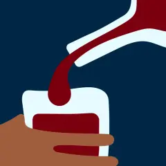 En hand håller ett glas medan mörkt vin hälls upp. En bild som kan symbolisera alkoholist beteende.