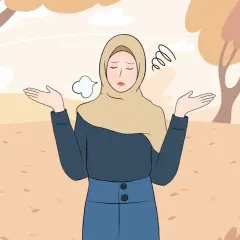 En kvinna i hijab med uppgivet uttryck, omgiven av höstlöv. Hon söker vägen till att vara fri från oro, ångest och fobier.