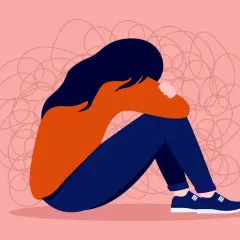 En person sitter hopkrupen, omgiven av trassliga linjer som symboliserar hur det känns när man undrar vad betyder toxic i relationer.