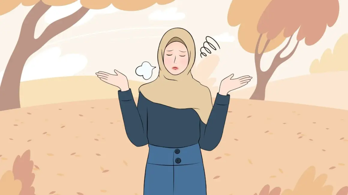En kvinna i hijab med uppgivet uttryck, omgiven av höstlöv. Hon söker vägen till att vara fri från oro, ångest och fobier.